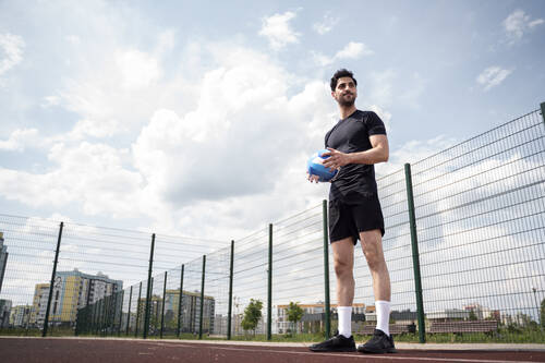 Young volleyball man player court (1)